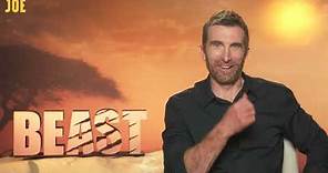 Sharlto Copley on Beast, hugging lions & an update on District 9 sequel