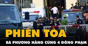 Cảnh sát dẫn giải bà Nguyễn Phương Hằng và các đồng phạm đến tòa