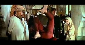Sheherazade (1962): Jean-Luc Godard, beggar walking on his hands