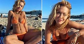 Rita Ora looks incredible in thong bikini as she sunbathes in Australia after joining The Voice panel