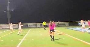 Amanda Thornton runs onto the through ball by Riley Cross to score