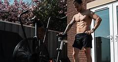 Gorka Marquez on Instagram: "DUMBBELLS & SUN🌞 Day one with the @assaultairbike in my hands and i already have that love/hate relationship😂 •Workout details• 21-15-9 Alternate arm DB thrusters @22.5 Cals Assault Bike 2min rest 21-15-19 Wall balls @9kg Cals assault bike 2 min rest 200 cals Assault bike for time *every 20cal do 10 air squats. And yes the Struggle was real🤮😂 *you can use any other bike if you have and if not you can do Burpees or double under’s .💪🏼 : : @assaultairbike @noccouk