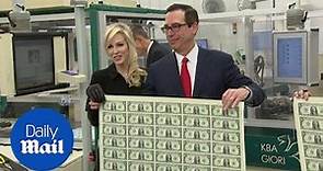 Steve Mnuchin and wife pose with newly minted $1 bills - Daily Mail