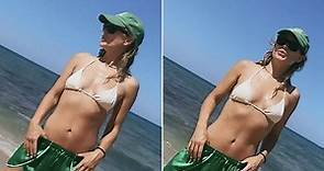 Olivia Wilde flaunts her toned figure in white bikini top