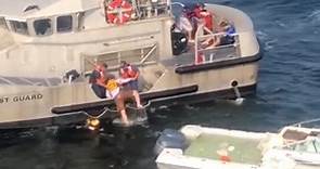 U.S. Coast Guards rescue 3 from a sinking boat