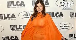 Donna D’Errico showcases her curves in sheer orange gown on first red carpet in over a year