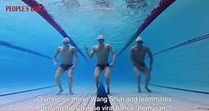 China's Olympic swimmer Wang Shun and teammates perform the Chinese viral dance "Kemusan," or "Subject Three."