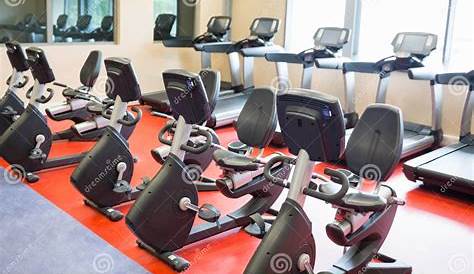 Row of Treadmills and Exercise Bikes Stock Photo - Image of physical