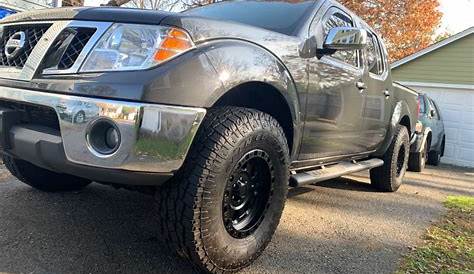 2010 Nissan Frontier with 16x8 American Racing Ar201 and 285/75R16 Toyo