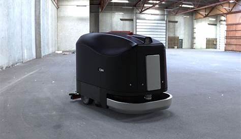 Automated floor cleaning robot working in a factory. | Commercial floor