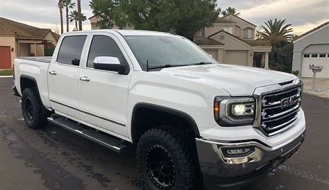 2018 GMC Sierra 1500 with 17x8.5 Method Nv and 33/12.5R17 Toyo Tires