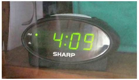 sharp electric clock set time