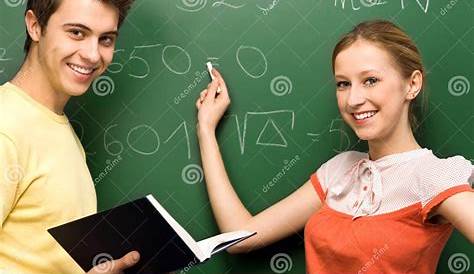 Students Doing Math On Chalkboard Royalty Free Stock Images - Image