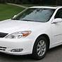 White Toyota Camry With Black Top