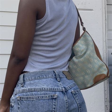 Light blue glitter ribbed tank top with a square... | Depop