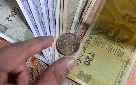 Rupee’s record fall sparks RBI clampdown