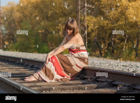 Beautiful Girl Sitting On Railroad Track Stock Photo Alamy