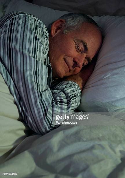 Old Man Sleeping In Bed Photos And Premium High Res Pictures Getty Images