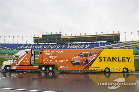 You will have to buy a nascar model kit, and since the gen 6 cars don't have a model kit out yet, you will also have to buy a resin body if they are available for the gen 6 fords. Hauler of Carl Edwards, Joe Gibbs Racing Toyota at Kansas