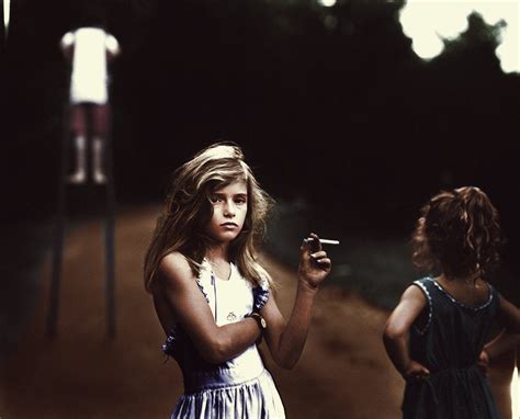 Sally Manns Daughter Jessie Mann Holding A Candy Cigarette In 1989