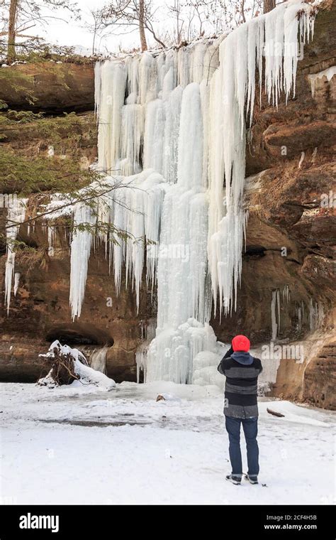 Visitor Photographs Frozen Lower Falls In Winter At Old Mans Cave