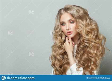 Blonde Beauty Young Perfect Woman With Long Healthy Shiny Hair On