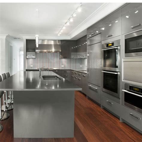 If you want to save time and money on updating your cabinets, then refacing rather than replacing them is definitely an option you need to consider. Slab Kitchen Cabinet Door in Solid Light Silver w Grid - AKC