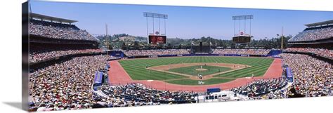Dodger stadium is the only stadium in the whole national league with a symmetrical outfield. Spectators watching a baseball match, Dodgers vs. Angels ...