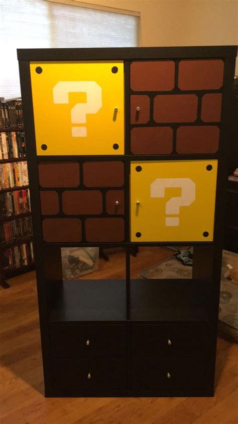 IKEA Kallax shelves with painted inserts for game room #