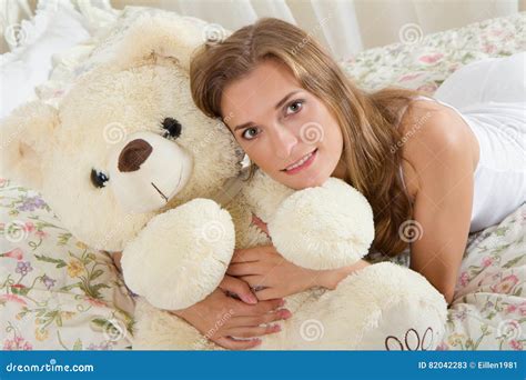 Young Lady In Bed With Teddy Bear Stock Image Image Of Love Pillow