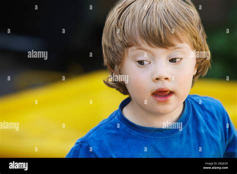 Boy 5 6 With Down Syndrome Stock Photo Alamy