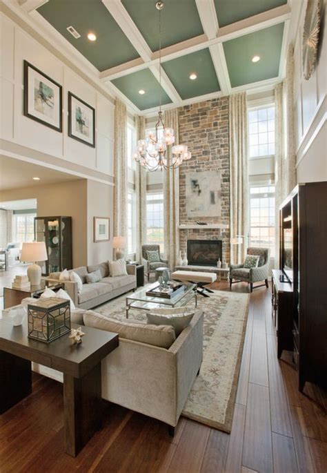 Living Room With High Ceilings And Fireplace With Windows Best 25