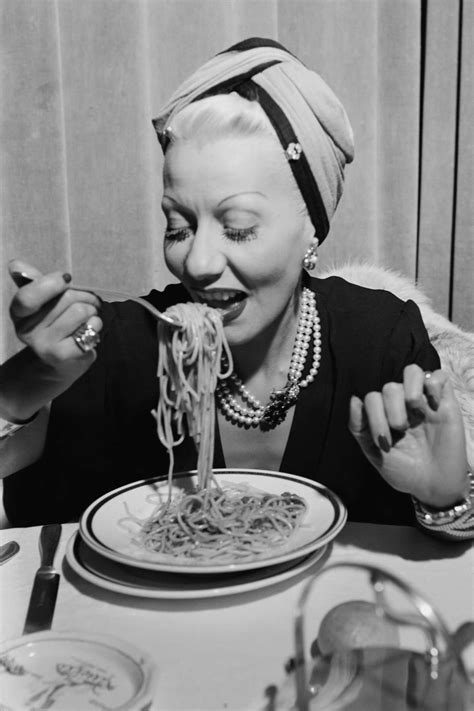 A Woman Eating Spaghetti At The Black And White Festival In Sanremo Italy Circa 1950 Italian