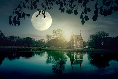 Spooky Moonrise Over Lake Stock Photo Download Image Now Ghost