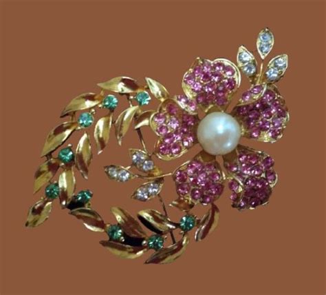 Save $100s with free paperless grocery coupons at your favorite stores! Sparkling flower and leaf wreath brooch. Gold tone ...