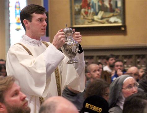the catholic post chrism mass fills cathedral as bishop and priests renew promises holy oils