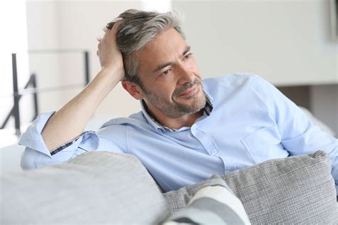 Smiling Handsome 45 Year Old Man Relaxing At Home Ron Barak