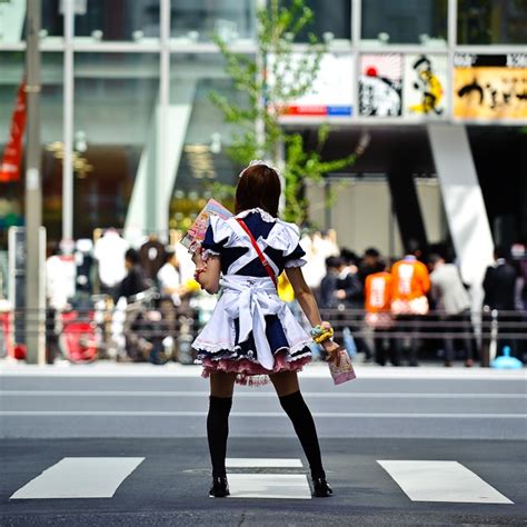 A Japanese Maid Cosplayer Getting Ready To Sell Sell
