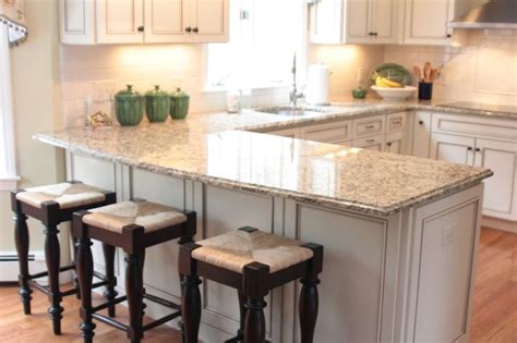 If the island area needed is large enough with a separate countertop from the kitchen set, while a peninsula is more in line with a minimalist home where the area needed is quite a bit with a countertop that integrates with the. White U-shaped kitchen with peninsula | Inspiration for ...