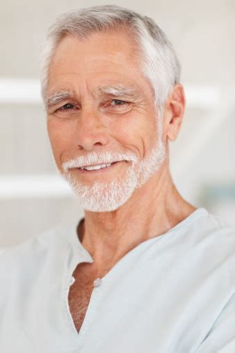 Closeup Of A Happy Old Man Smiling Stock Photo Download Image Now