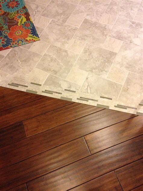 Canadian distributor of sustainable, high quality bamboo building material for environmentally conscious pros & homeowners white mosaic tiles cabin chic interior decorating interior design decorating ideas decor ideas rustic luxe cabin kitchens house design photos. Floor remodel. Transition from Cali Bamboo to tile ...