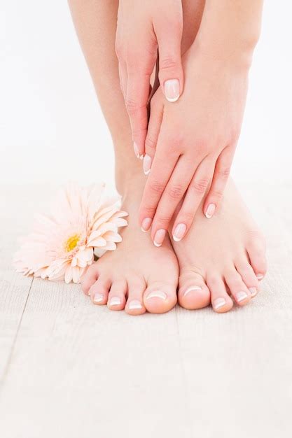 Premium Photo Keeping Her Feet Clean And Smooth Close Up Of Woman Touching Her Feet While
