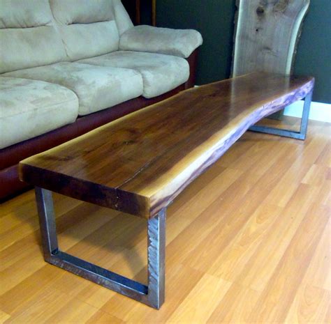This beautiful piece of walnut came from an expropriated piece of land where the road was increased in width. Live Edge Black Walnut Coffee Table