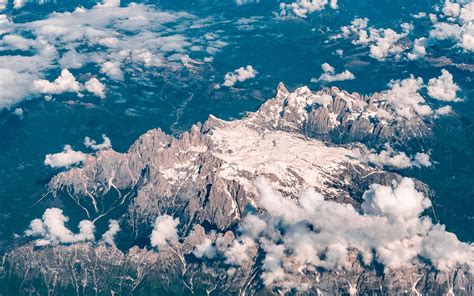 Download Wallpaper 1680x1050 Mountains Clouds Aerial View Land