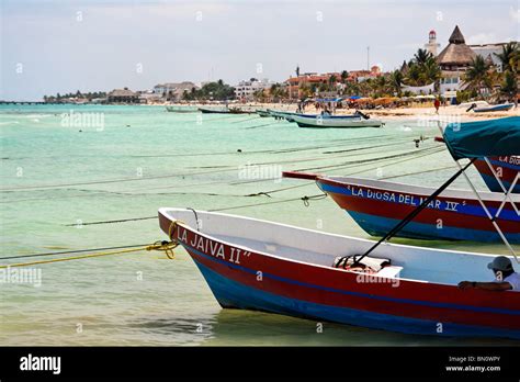 Fishing Boats Anchored On A Beach Playa Del Carmen Mexico Stock Photo
