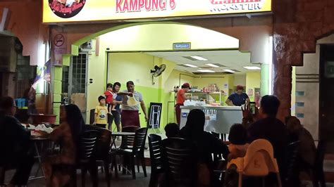 The roti canai kayu arang restaurant serves roti canai prepared on a charcoal stove. Roti canai Terbang Melaka - YouTube