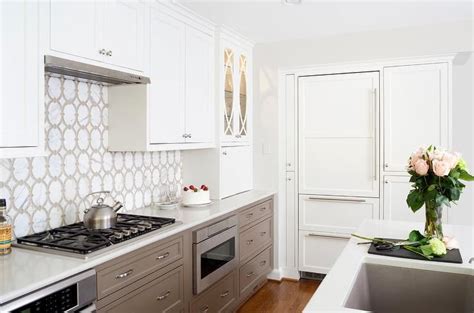 Most kitchen cabinets that use metal drawers have at least 2 metal sides on each drawer where the drawer slides attach and function within the sides. White upper cabinets and taupe lower cabinets | Upper ...