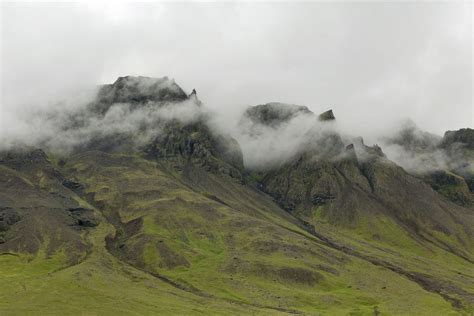 Clouds On Mountaintops Near Reykjavik Natural Landmarks Photo