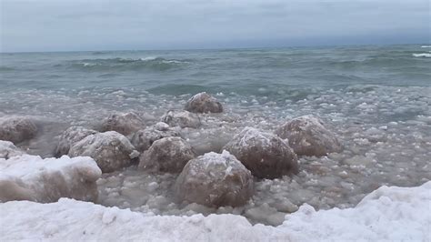 Video Shows Incredible Spheres Of Ice Forming On Lake Michigan Youtube