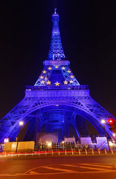 The Eiffel Tower Lit Up In The Colors Of The European Flag To Mark